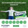 Žena leží na tráve vedľa balenia BIOPRON Imunita 30 kapsúl, vedľa sú tipy na príjem vitamínu D v slovenčine.