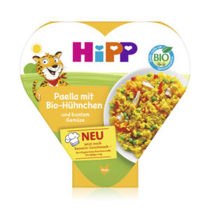 HiPP BIO Paella so zeleninou a kuracím mäsom 1r+, 250g: balenie v tvare srdca s tigrom, viditeľná žltá ryža, zelenina a kuracie mäso.