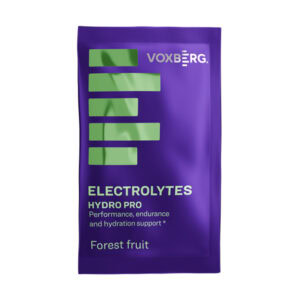 Zelený balíček s označením VOXBERG Elektorlyty HYDRO PRO, príchuť jablko, určený na výkon, výdrž a hydratáciu.