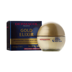 Pohárik DERMACOL GOLD ELIXIR omladzujúci nočný krém 50 ml pred škatuľou, obe s modrými a zlatými prvkami.
